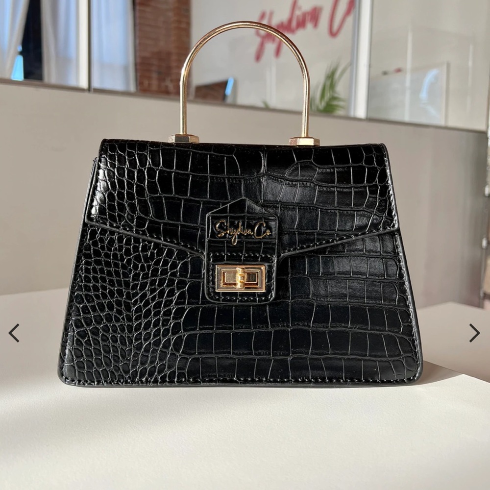 Black top handle bag